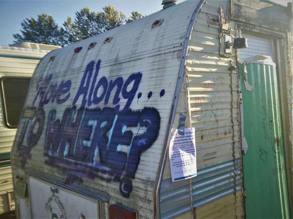 Vehicle residents in Seattle have protested relocation and ticketing.