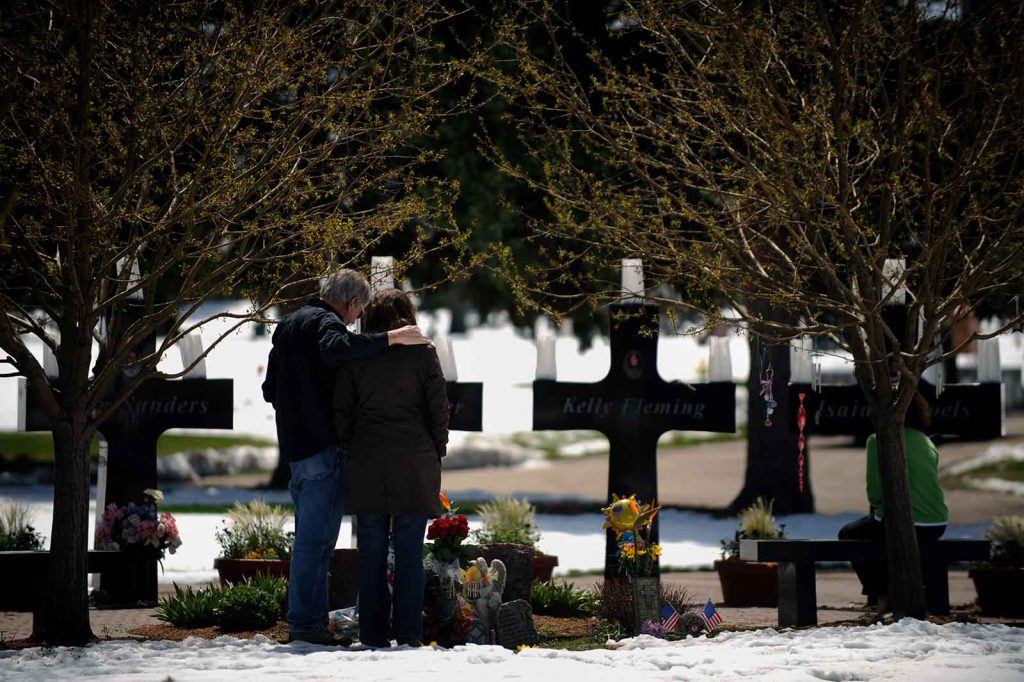 gun research ban - Darrell and Sandy Scott visit their daughter’s grave at the Columbine Memorial Garden in Littleton, Colorado. The 20th anniversary of the shooting was in April of this year.