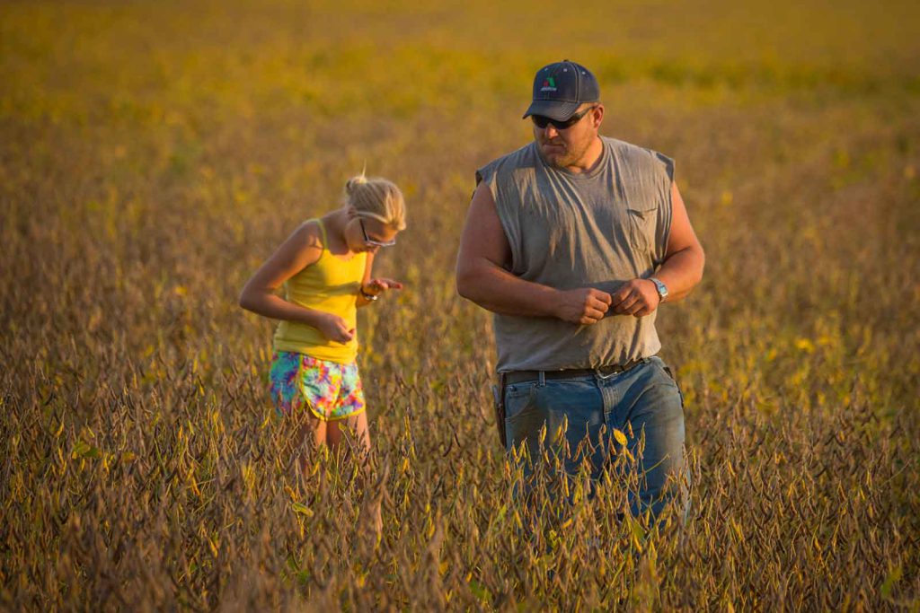 The idyllic view of the U.S. family farm encompasses multiple generations living together on the land, as on this Iowa farm.