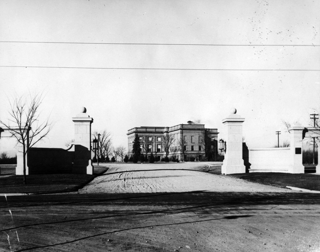 The Joshua Monti memorial gate marks the east entrance to the Colorado Museum of Natural History (now the Denver Museum of Nature & Science), seen here during the winter of 1916–1917.