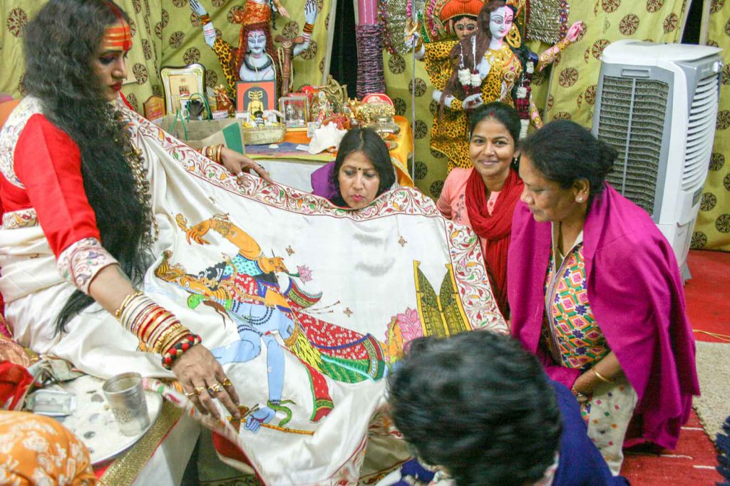 Tripathi displays a sari depicting Hindu god Lord Shiva in an androgynous avatar.