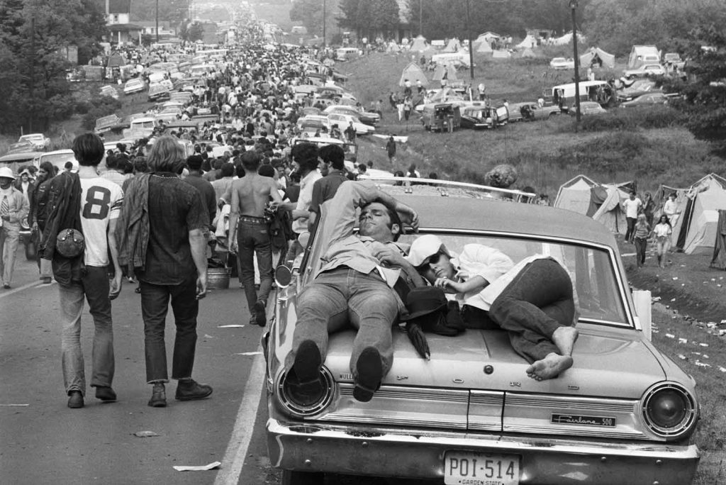 A flood of hundreds of thousands of unexpected attendees made Woodstock a chaotic—and unforgettable—experience.