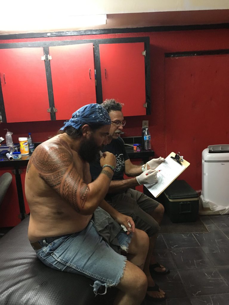 Anthropologist Christopher Lynn collects data in American Samoa.