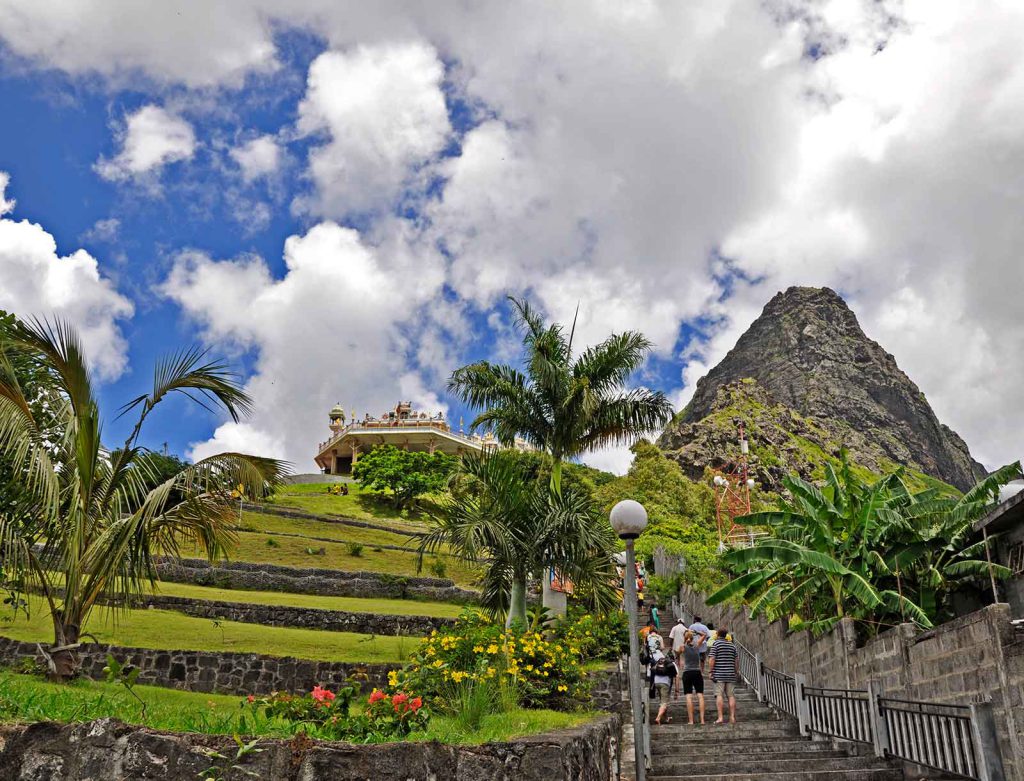 During the kavadi ritual in Mauritius, pilgrims carry portable shrines up these steps to the temple of Lord Murugan.