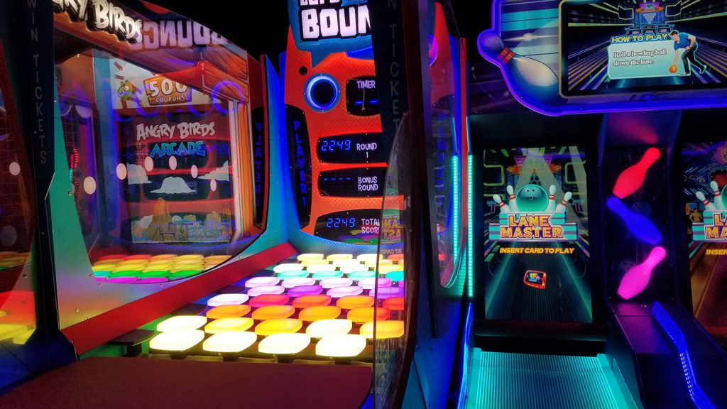 Dave and Buster’s, a restaurant and video arcade, buzzes with activity and noise.