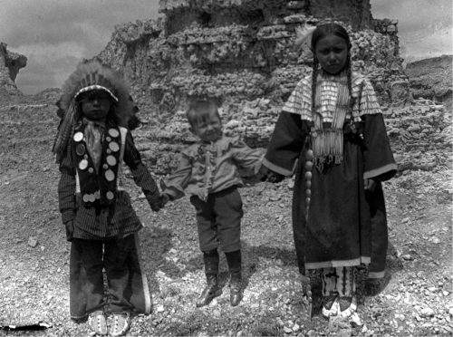 native american boarding schools - Despite the U.S. government’s efforts, Native American children endured with many of their traditional practices intact. In this photo, Bratley’s son, Homer, stands in stark contrast to the Lakota children his father taught on the Rosebud Reservation. As current Rosebud tribal member Cathleen High Pipe told us, “We carry on everything that we were taught that was handed down to us by our parents and from what their parents gave them.”