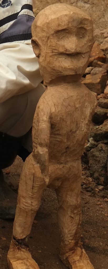 A local Batwa craftsperson sculpted this wooden figure.