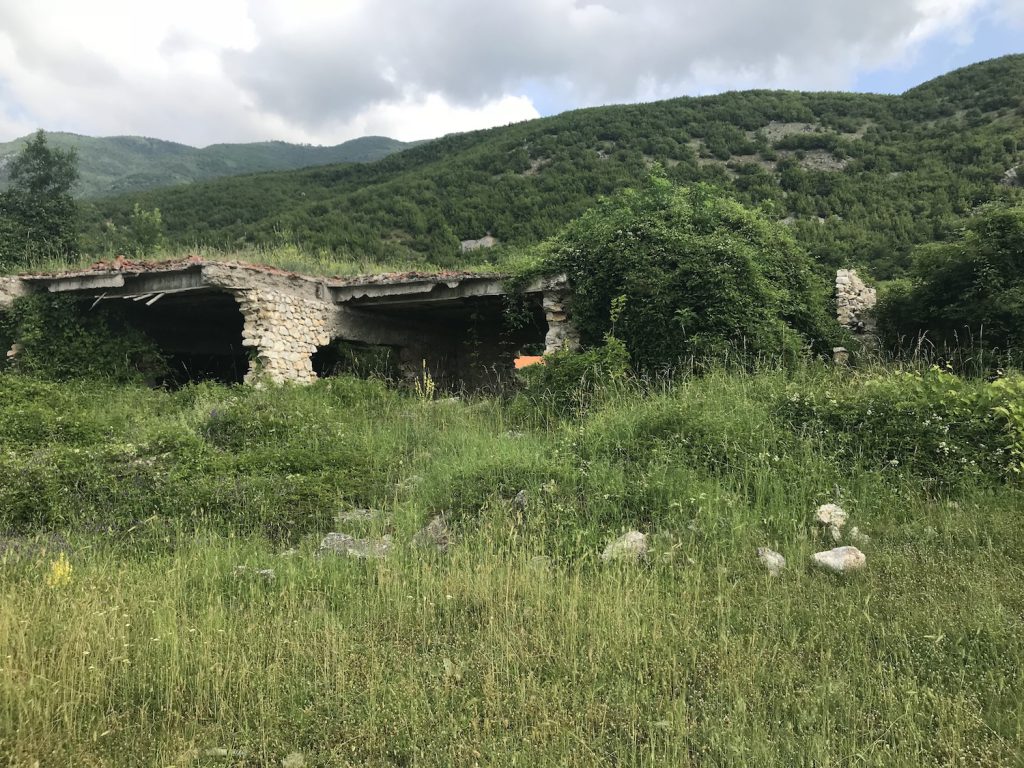 Kosova or Kosovo - Ruined buildings serve as reminders of the lives lost and displaced by the Kosovo War more than two decades ago.