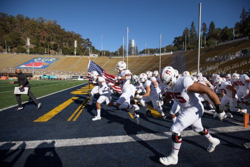 college football racial capitalism - Despite the health risks, many college football teams, such as the Stanford Cardinal (pictured here), have continued playing throughout the fall season.
