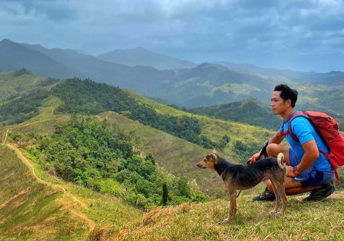 dog breeds race - The author enjoys the company of a village dog named Blacky while hiking in the Sierra Madre mountains of Bulacan Province in the Philippines.
