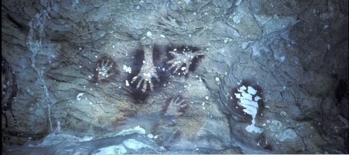 Sulawesi cave paintings - These handprints were made by blowing pigment around a hand placed against the wall.
