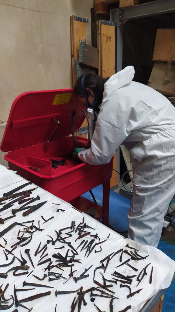 archaeology notre dame cathedral - Researchers clean medieval metal nails and pins taken from the cathedral’s roof and carpentry work.