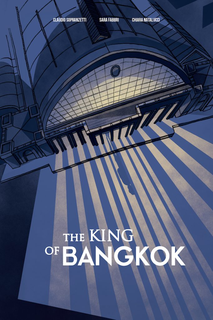 The book cover of The King of Bangkok features an overhead illustration of a blue building with a curved roof and pillars. Light illuminates the windows and spills out into the dark street.