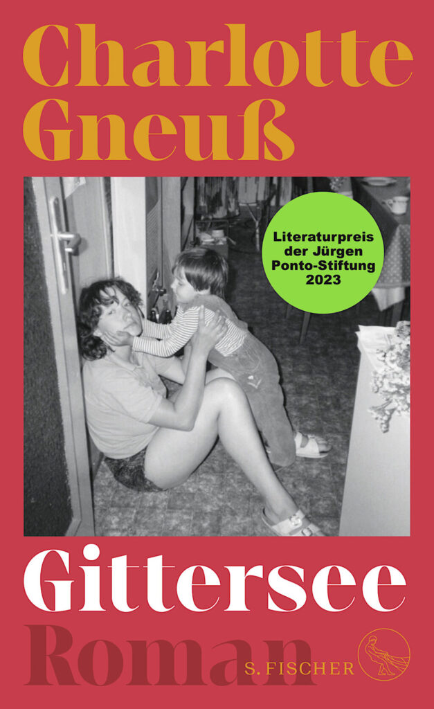 A red book cover features a black-and-white photo of a person holding a child while sitting on a tiled floor. Above the photo, yellow text reads, “Charlotte Gneuss.” Below the photo, different colored text reads, “Gittersee Roman, S. Fischer.”