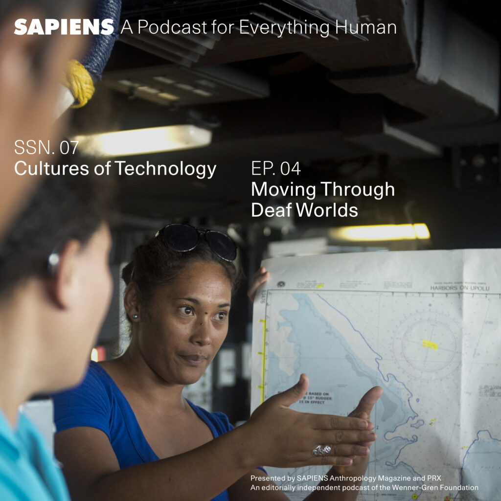 A promotional image for the SAPIENS podcast episode "Moving Through Deaf Worlds" from season 7, episode 4, titled "Cultures of Technology." The image features a woman holding a map and gesturing while speaking to another person, highlighting the show's exploration of human experiences and cultures.